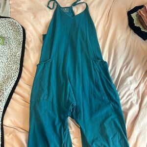 Never worn, dark blue free people jumper. Perfect condition